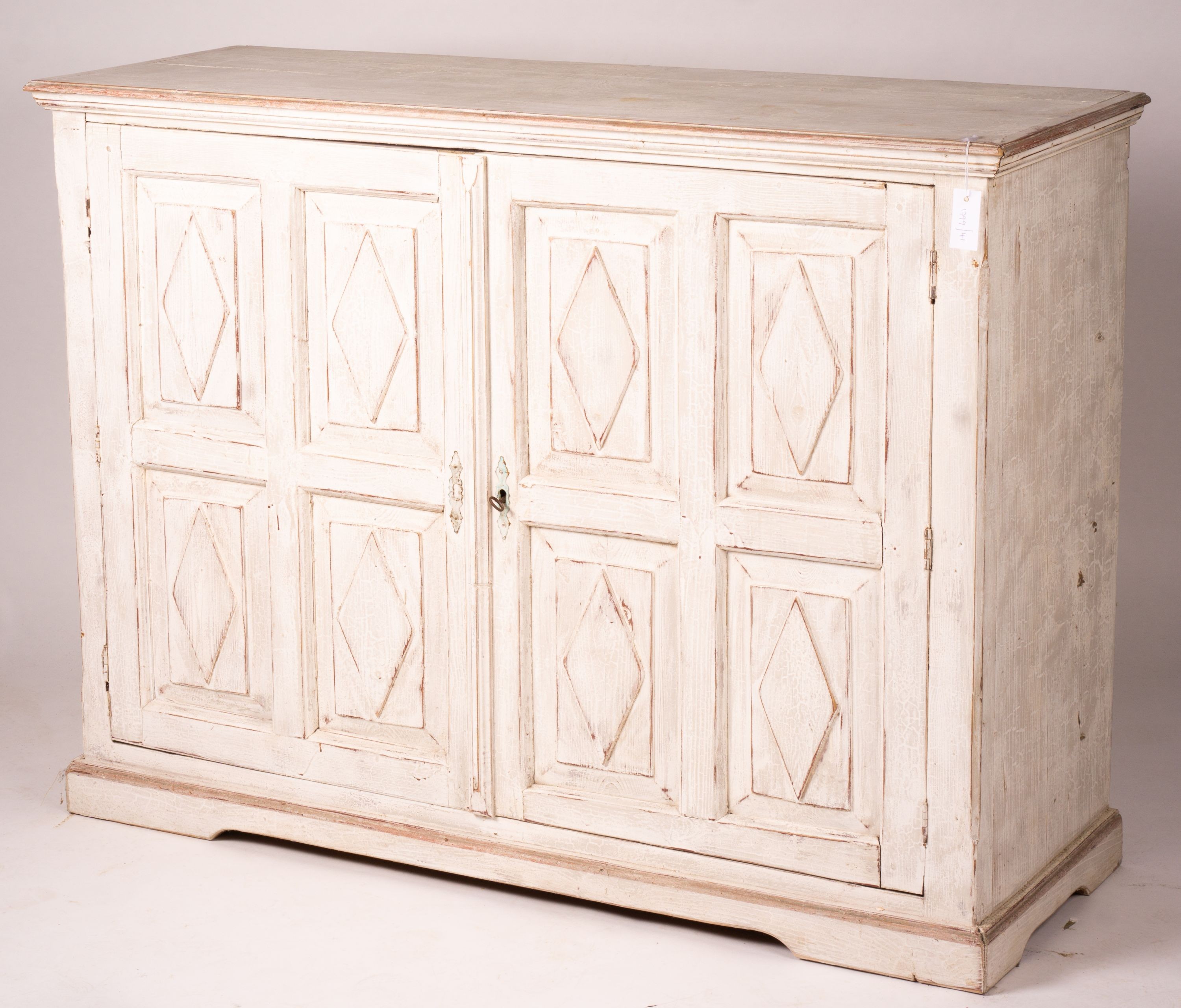 A 19th century Continental painted pine two door side cabinet, width 142cm, depth 50cm, height 106cm